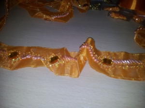 Orange ribbon with amber glass and emboidery, bargain bin bargain! £1 for 3m